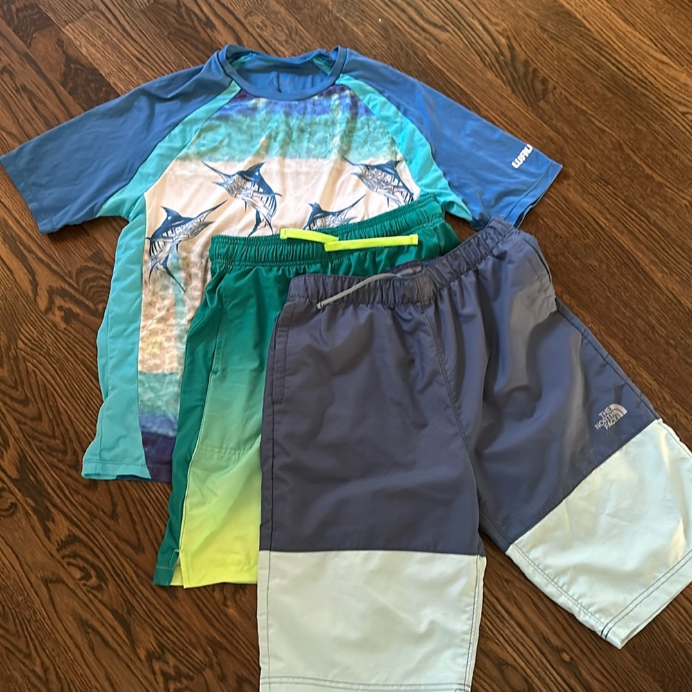 Lot of 1 sun shirt and 2 water shorts (size 18-20)